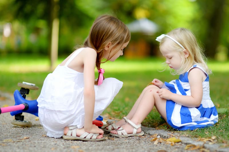 Girl fell down and crying- how to teach your child to be independent