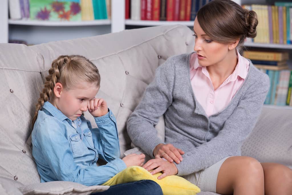 mom consoling girl- what is positive discipline? positive discipline techniques that work