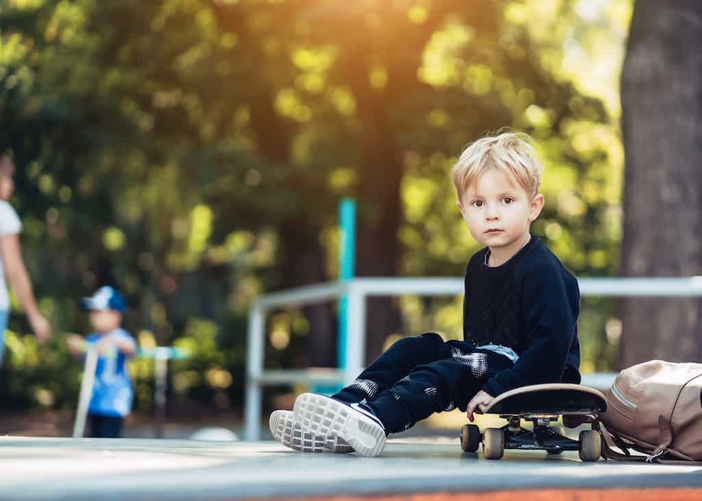 boy in park- what is positive discipline? positive discipline techniques that work