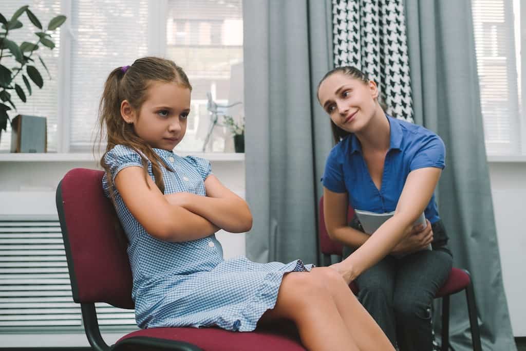 mom talking to daughter - what is positive discipline? positive discipline techniques that work