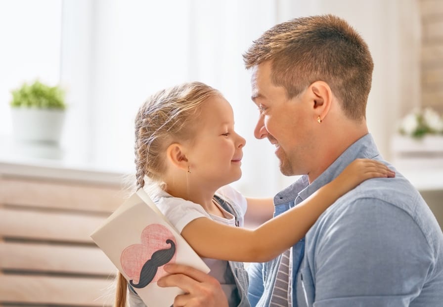 Loving dad talking to daughter