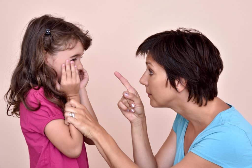 Mom scolding daughter