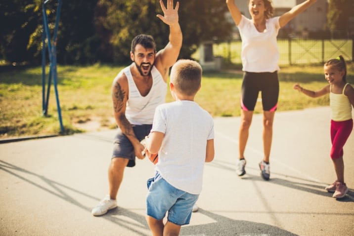 Family playing basketball together as a family ritual