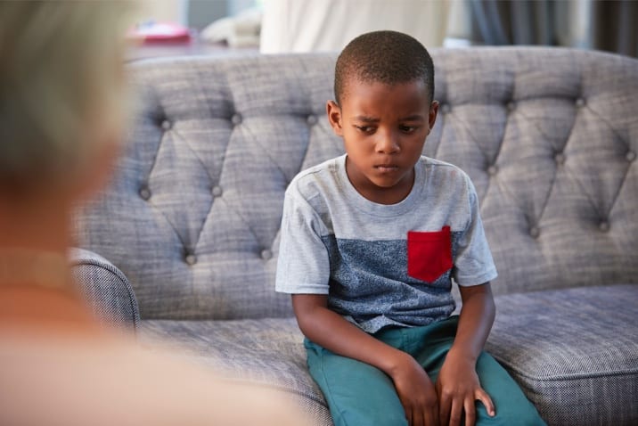 boy looking sad- why we should let boys cry