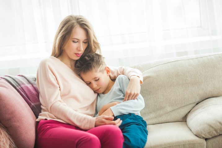 mom hugging son