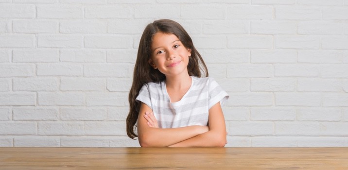 a confident girl smiling-list of basic good manners for kids