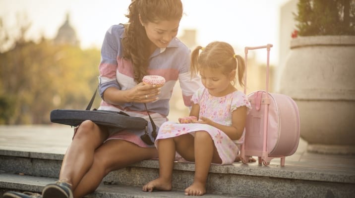 a mom and daughter eating donuts together-list of basic good manners for kids