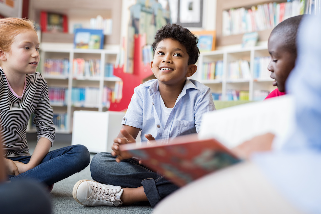 Some kids sitting in a circle-how to develop intrinsic motivation in kids-child led learning