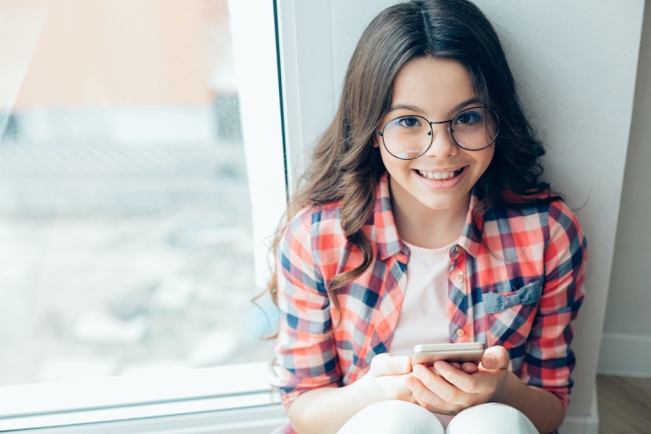 a girl using her mobile