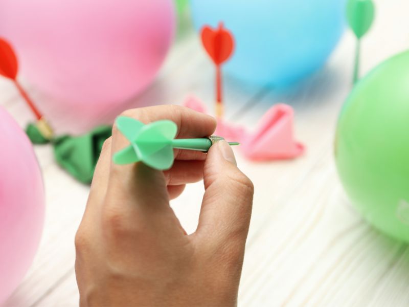 a dart and balloons - easy and fun balloon games for toddlers and preschoolers
