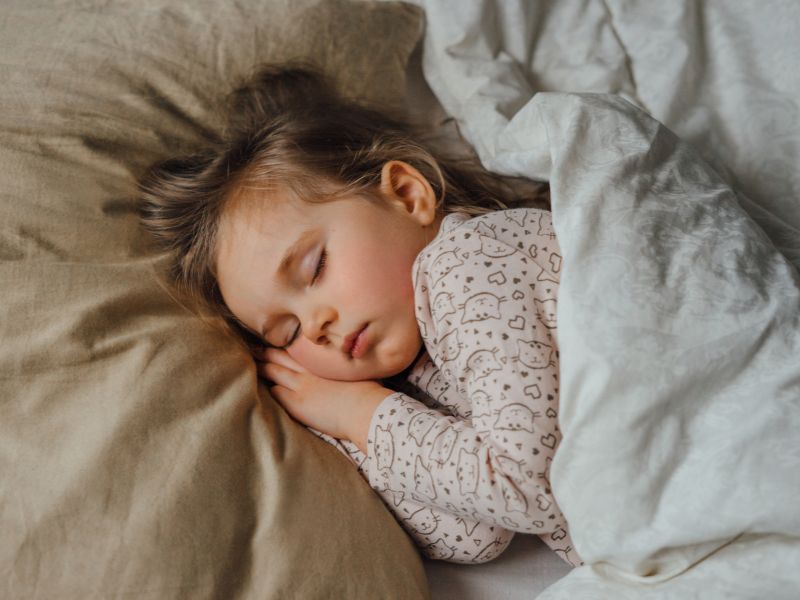 a girl sleeping - establishing a bedtime routine for kids